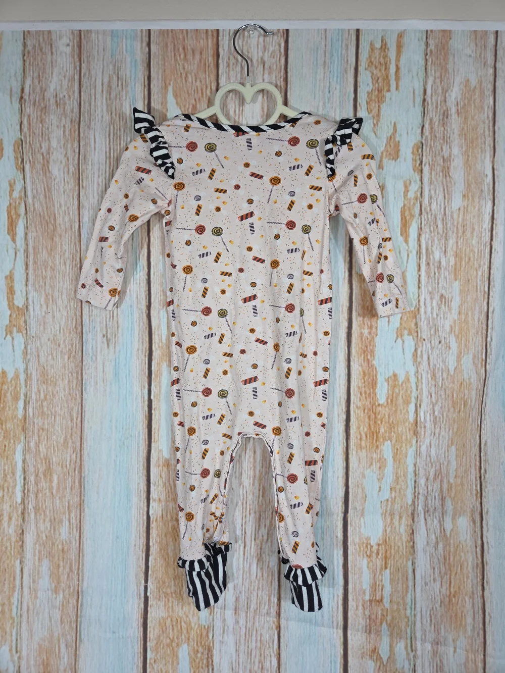 Ricrac & Ruffles Halloween Candy Print Romper in Cream w/black Trim. Size 18m